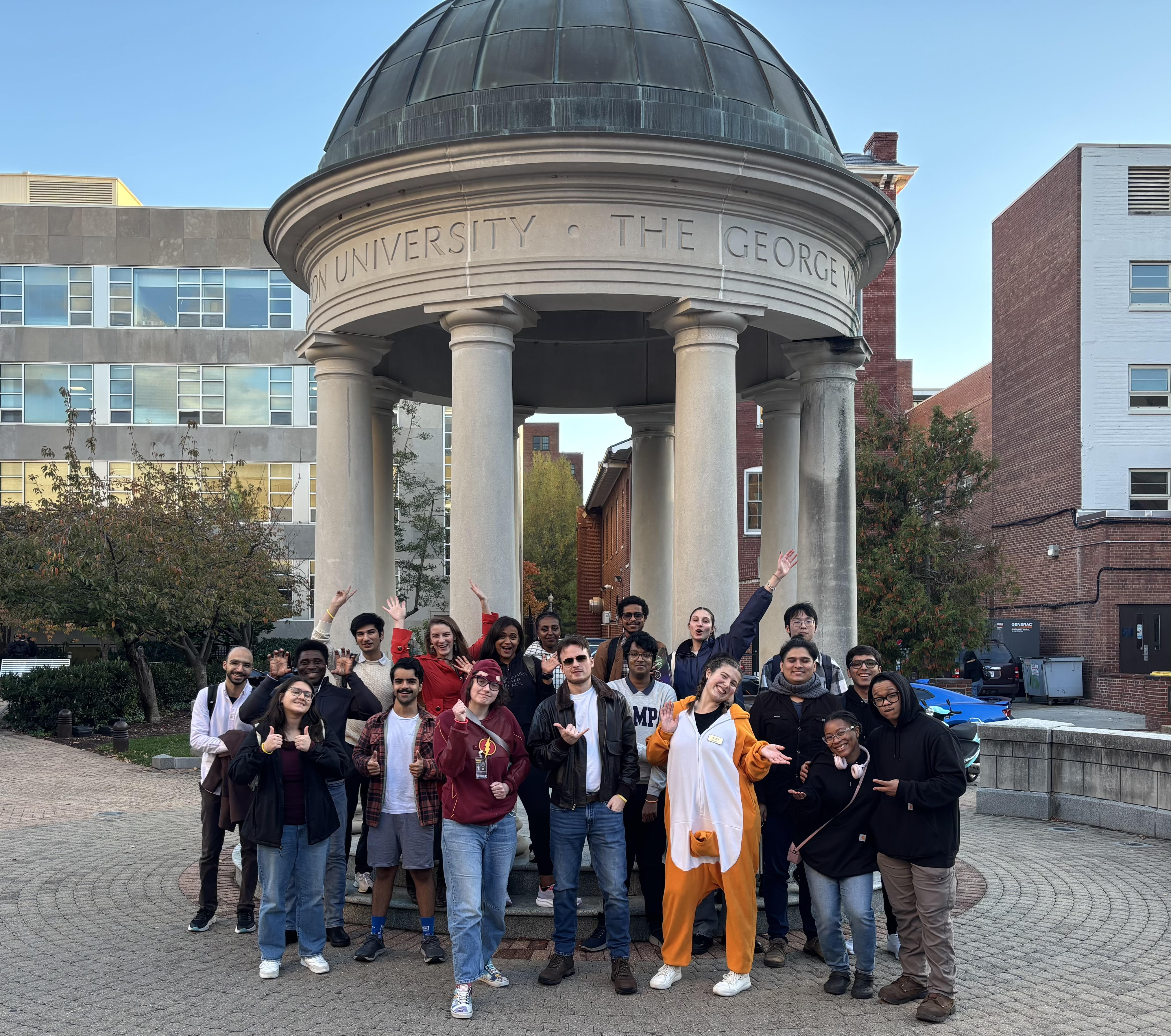 Graduate Students Taking a Picture in front of Kogan Plaza