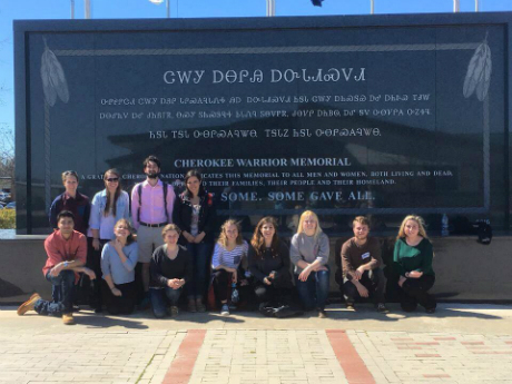 group in front of monument 