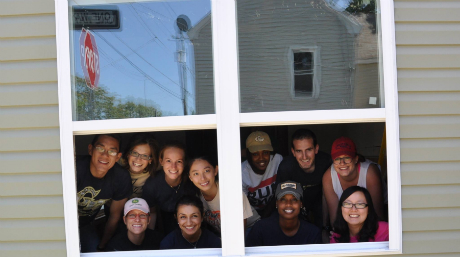 group of students in house window