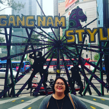 person standing in front of gangnam style sign