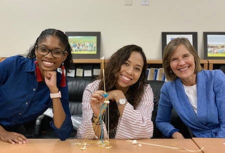 Tereese, Camilla and Rachel participating in the Marshmallow Tower Challenge