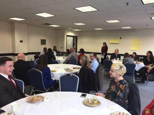 Participants talking at a meeting