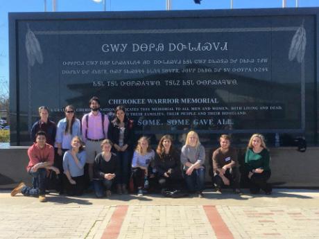 group in front of monument 