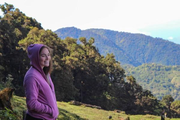 michelle standing in front of mountain landscape